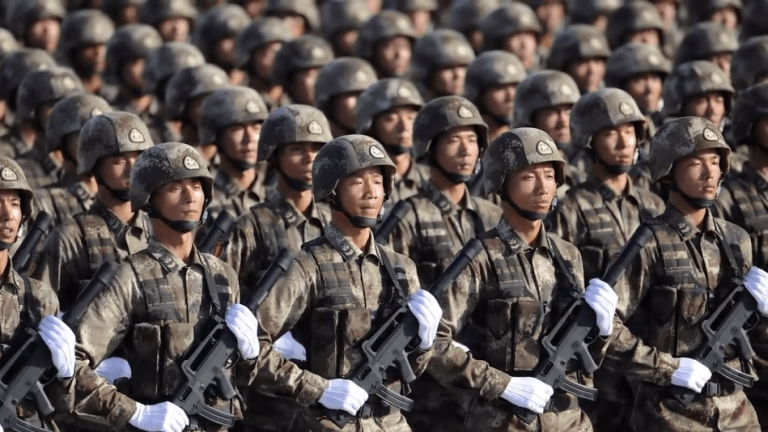 chinese military people's liberation army soldiers march in even rows holding qbz-95 assault rifles and white gloves on parade in Beijing