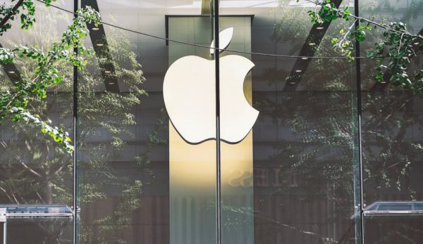 The Apple company logo at an Apple store.
