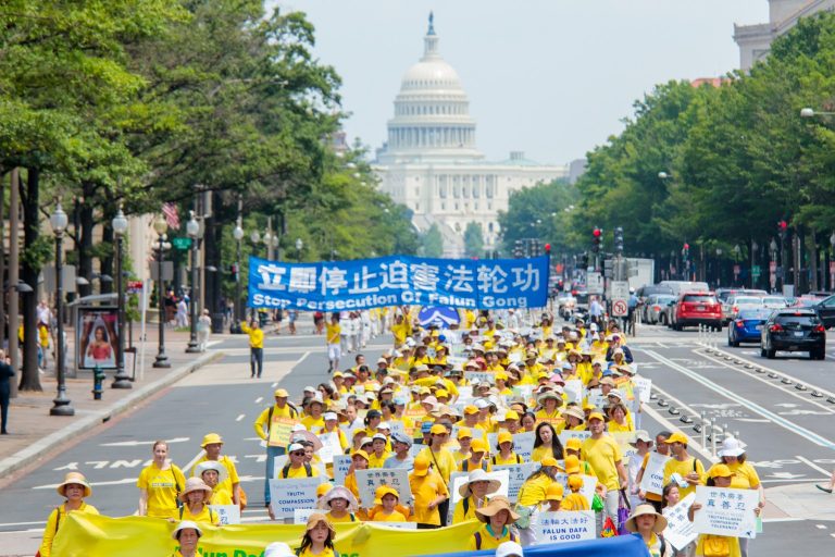 Falun Gong practitioners take part in a parade through Washington, D.C. in July 2017 to protest the Chinese regime's persecution of their faith. The U.S. Department of State (state department) led by Trump administration official Mike Pompeo has imposed the first U.S. sanctions on a CCP official for persecuting Falun Gong.