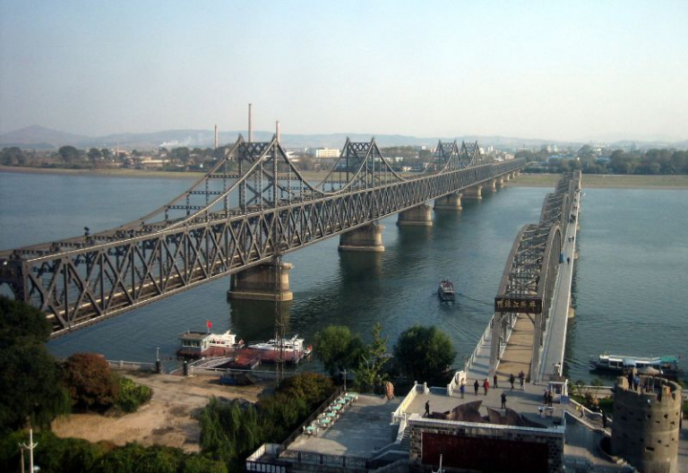 The two bridges on the Yalu River, Friendship Bridge (L) and Broken Bridge (R), that connect North Korea and China from Dandong province, on October 2008.