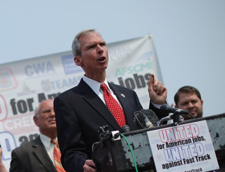 Rep. Dan Lipinski (D-IL) (2nd R) and fellow Democratic members of Congress hold a news conference to voice their opposition to the Trans-Pacific Partnership trade deal at the U.S. Capitol June 10, 2015 in Washington, DC. (Image: Chip Somodevilla/Getty Images)
