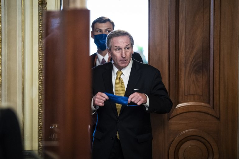 Michael van der Veen, lawyer for former President Donald Trump, walks to the Senate floor through the Senate Reception room on the fourth day of the Senate Impeachment trials for former President Donald Trump on Capitol Hill, February 12, 2021 in Washington, D.C.