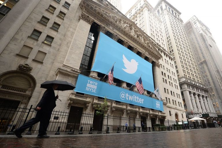 A banner with the logo of Twitter is set on the front of the New York Stock Exchange (NYSE) on November 7, 2013 in New York. Twitter revealed big plans to double its revenue and development efforts by Q4 2023 with a revolution of its platform during its 2021 Analyst Day