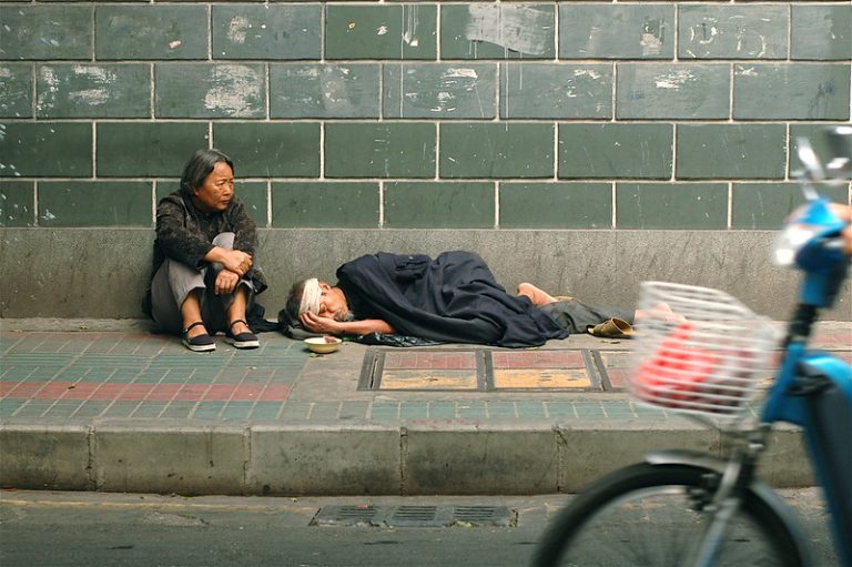 While the Communist regime claims that Chinese poverty was defeated in 2020, many households still fall below the World Bank’s poverty line of US $5.50 for upper-middle-income countries such as China. Beggars are pictured on the streets of Guangzhou, China