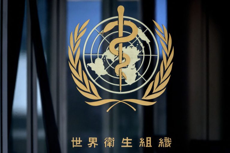 This photograph taken on March 5, 2021 shows a sign of the World Health Organization (WHO) at the entrance of their headquarters in Geneva. The WHO said its verdict on the Coronavirus origin may not come for years at a press conference in London on March 10.