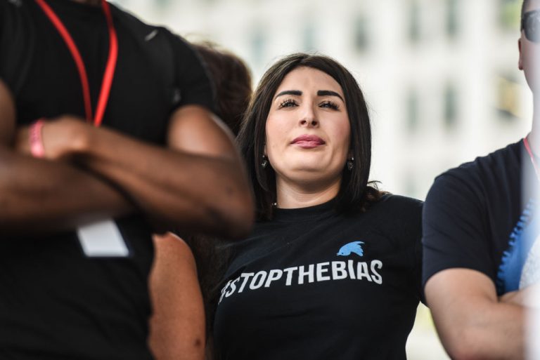 Laura Loomer waits backstage during a ‘Demand Free Speech’ rally on Freedom Plaza on July 6, 2019 in Washington, D.C. Loomer had a 2018 video questioning Critical Race Theory censored by YouTube a few days after Stripe banned donations to her 2022 run for Congress.