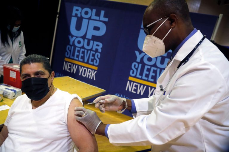 As of April 26, 44% of New Yorkers have received at least one Coronavirus Disease 2019 (COVID-19) vaccine dose, and 31% are fully vaccinated. Pictured is Eugenio Brito, Vice President of Bodegas of America, receiving a Pfizer vaccination shot on April 23 at an event to announce five new walk-in pop-up vaccination sites for New York City Bodega, grocery store and supermarket workers.