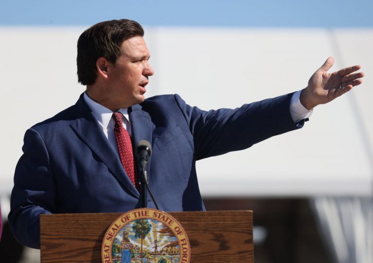 Florida Governor Ron DeSantis speaks during a press conference about the opening of a COVID-19 vaccination site at the Hard Rock Stadium on January 06, 2021 in Miami Gardens, Florida. DeSantis signed an Executive Order outlawing vaccine passports in Florida on April 2.