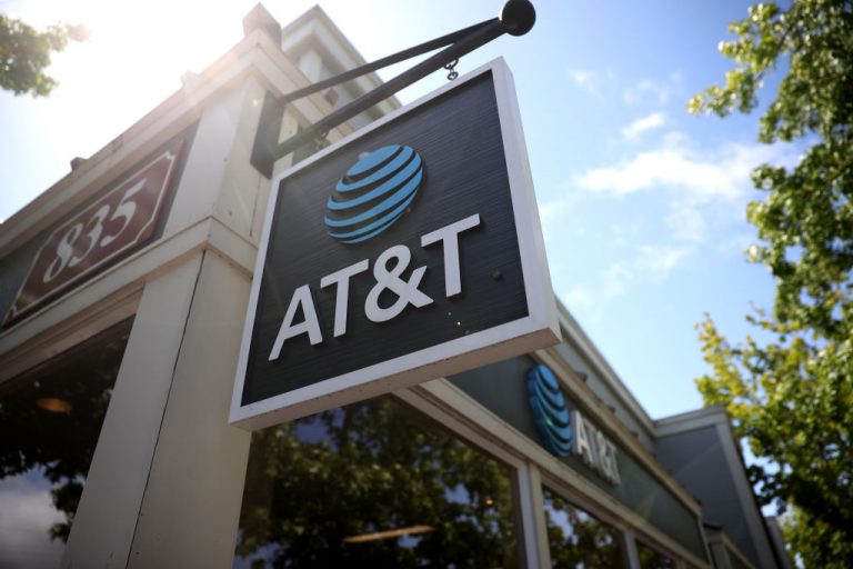 A sign is posted in front of an AT&T retail store on May 17, 2021 in San Rafael, California. AT&T, the world’s largest telecommunications company, announced a deal with Discovery, Inc. which will spin off AT&T's WarnerMedia and be combined with Discovery to create a new standalone media company.