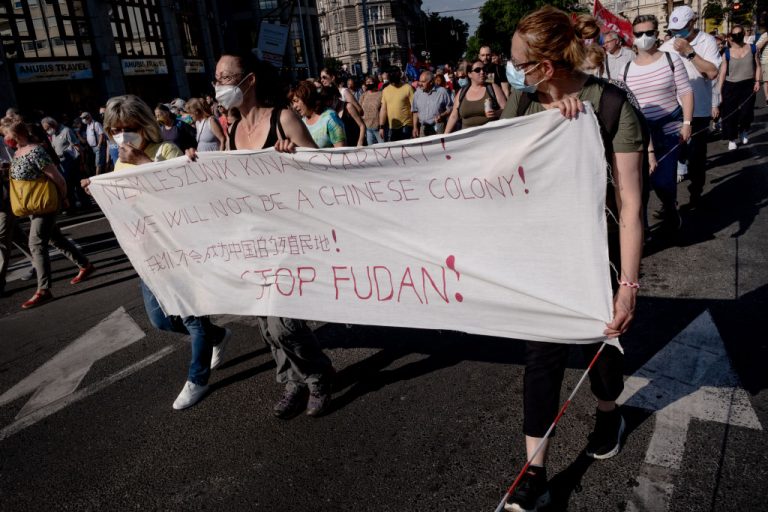 Protestors march during a demonstration against the planned Chinese Fudan University campus on June 5, 2021 in Budapest, Hungary. On June 2, the mayor of Budapest renamed four streets on the outskirts of the proposed site to host a university campus funded by by Chinese Communist Party, after the CCP’s political opponents.