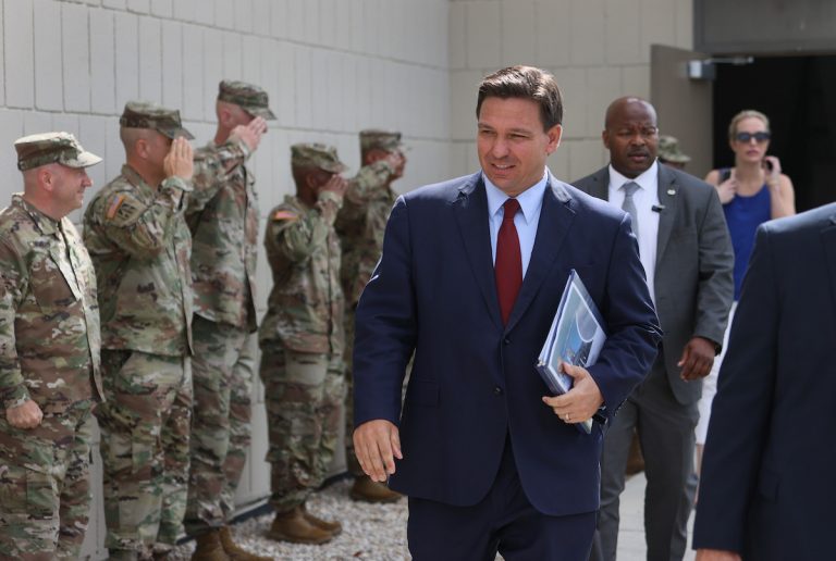 Florida Gov. Ron DeSantis Florida will be sending law enforcement personnel to help Arizona and Texas deal with the influx of illegal immigrants. He is pictured at a bill signing ceremony at the Florida National Guard Robert A. Ballard Armory on June 7, 2021 in Miami, Florida. The governor signed bills to combat foreign influence and corporate espionage in Florida from governments like China.