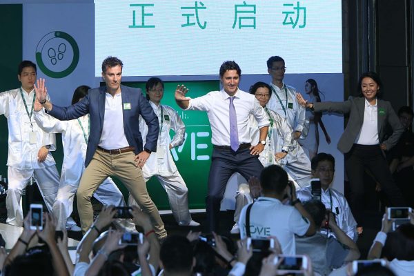 Justin Trudeau, center, performs “Tai Chi” during the launch ceremony of Canadian investment firm Manulife’s Move program on September 2, 2016 in Shanghai, China while he was in the country for the G20. For many Canadians, Trudeau’s coziness with the Chinese Communist Party is too-close-for-comfort.