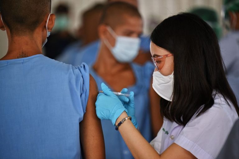 An inmate receives a dose of the Sinopharm Covid-19 coronavirus vaccine at Chonburi Central Prison on June 25, 2021.