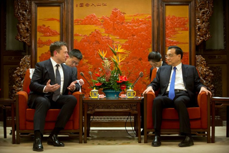 Tesla CEO Elon Musk (L) speaks as Chinese Premier Li Keqiang listens during a meeting at Zhongnanhai in Beijing on January 9, 2019. Musk renewed his commitment to providing investment to the Chinese Communist Party as Tesla becomes more and more reliant on production from the Shanghai Gigafactory.