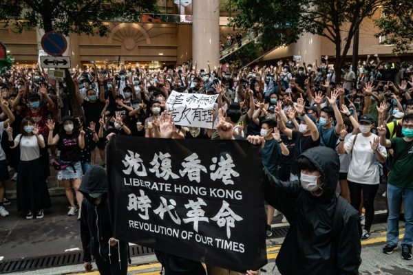 Hong Kong Citizens protest the CCP-installed National Security Law law on July 1, 2020 in Hong Kong. The situation in the city boils down to factional struggles within the Party that stem back to corruption and cronyism created under former CCP Chairman Jiang Zemin.