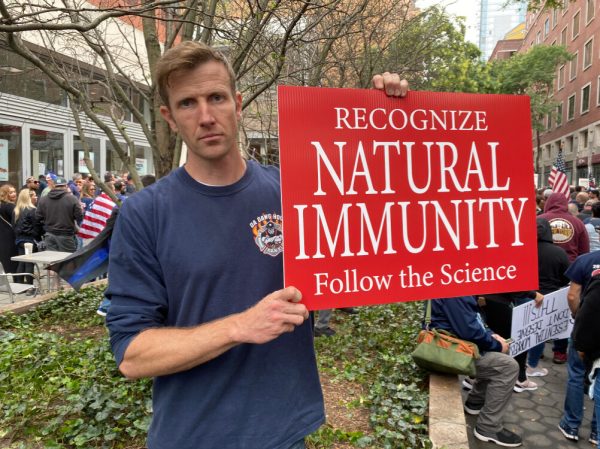 FDNY Captain Jason Wendell speaks of natural immunity exemptions at a vaccine mandate protest in New York City on Oct. 26, 2021.