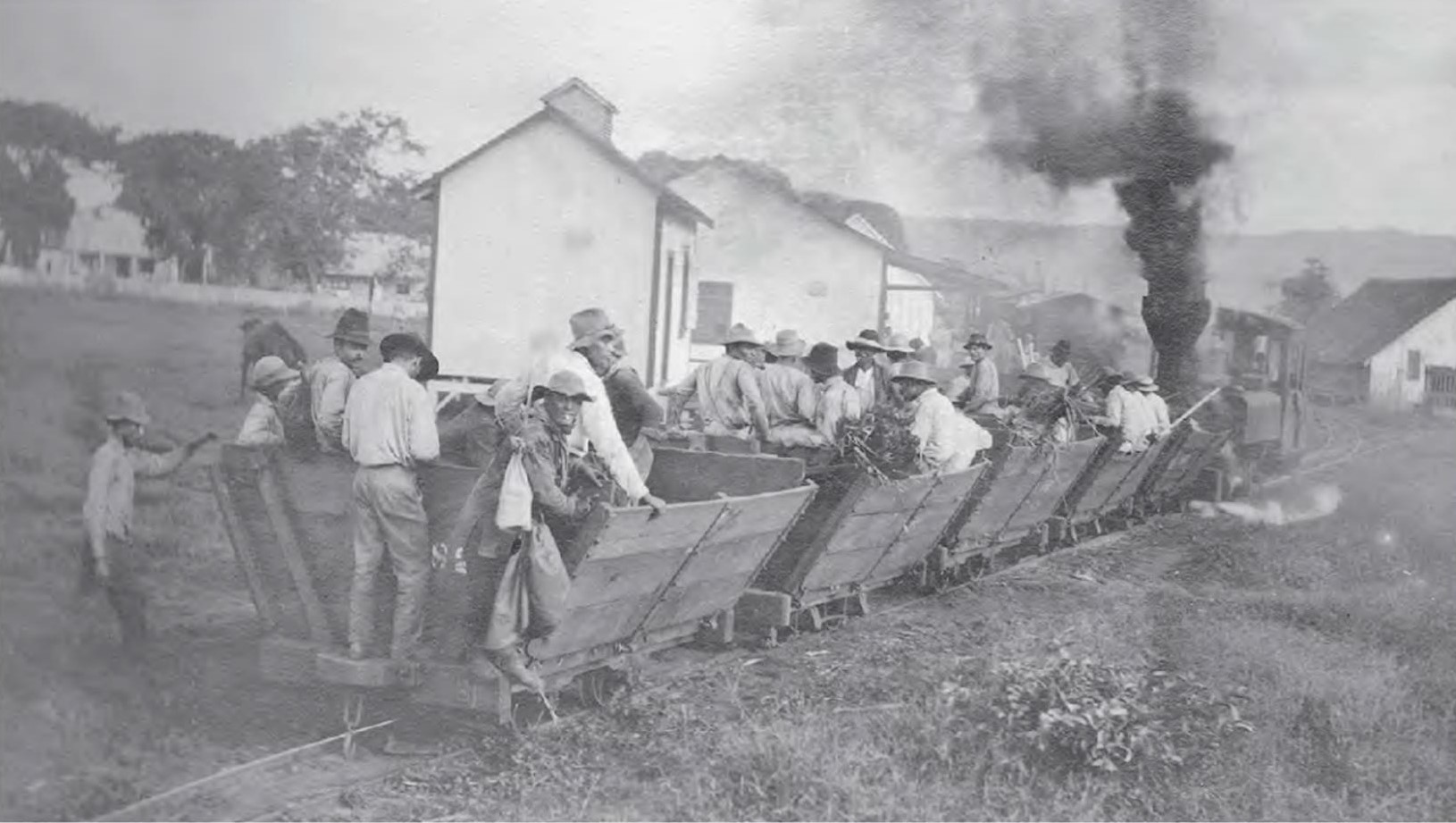 sugar-plantation-train-carrying-slaves-wikimedia-commons