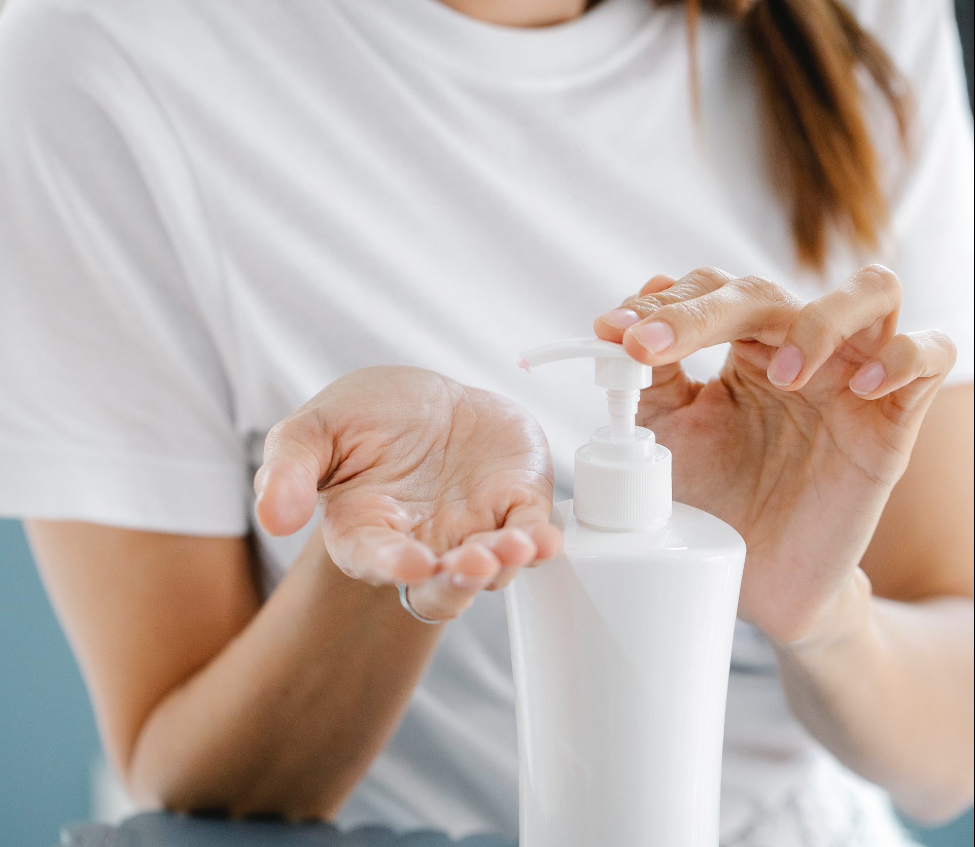 woman-with-lotion-pexels