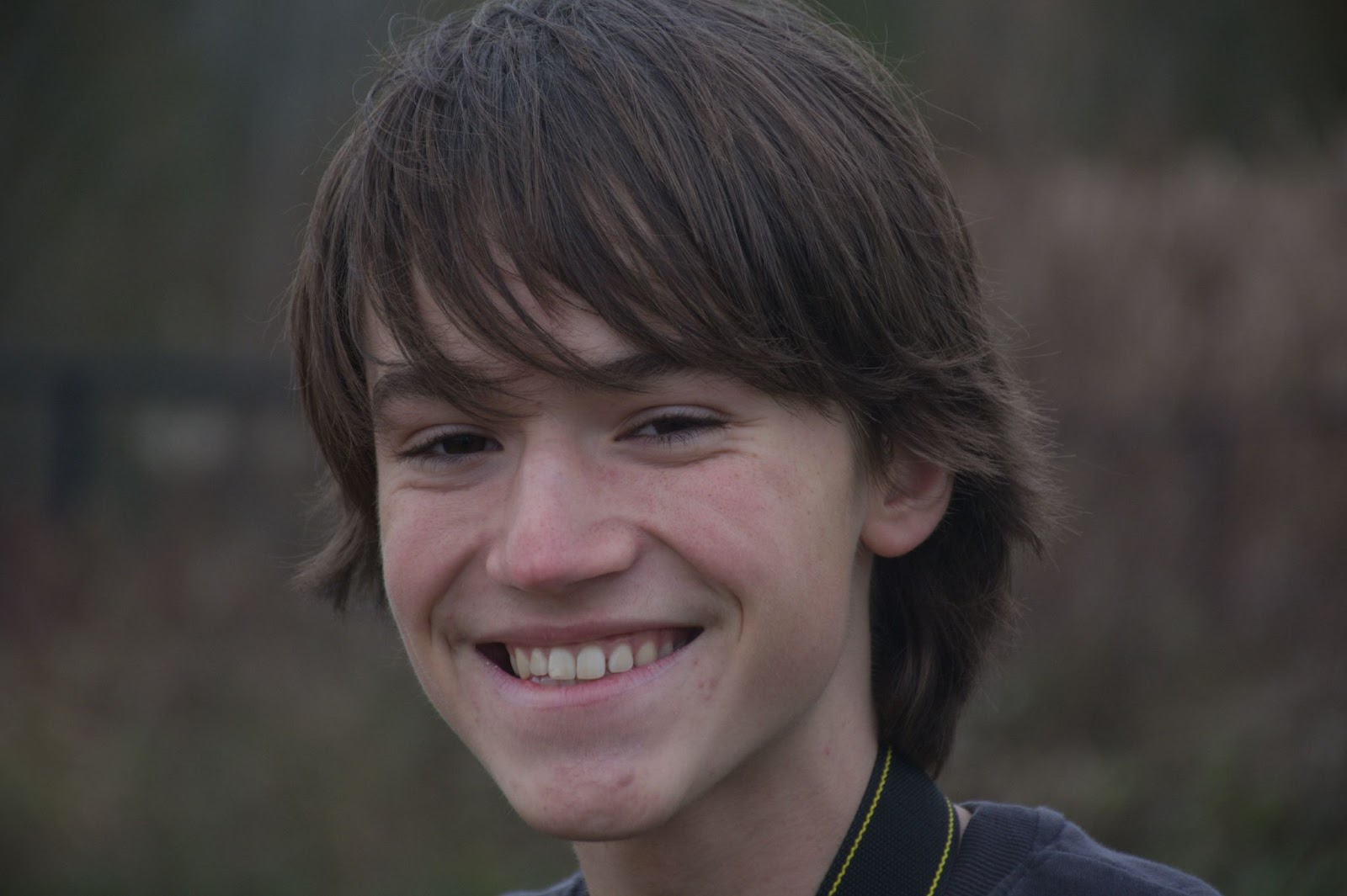 Smiling-teenage-boy-wikimedia-commons