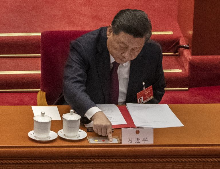 xi-jinping-presses-button-two-sessions-ccp_GettyImages-1231642347