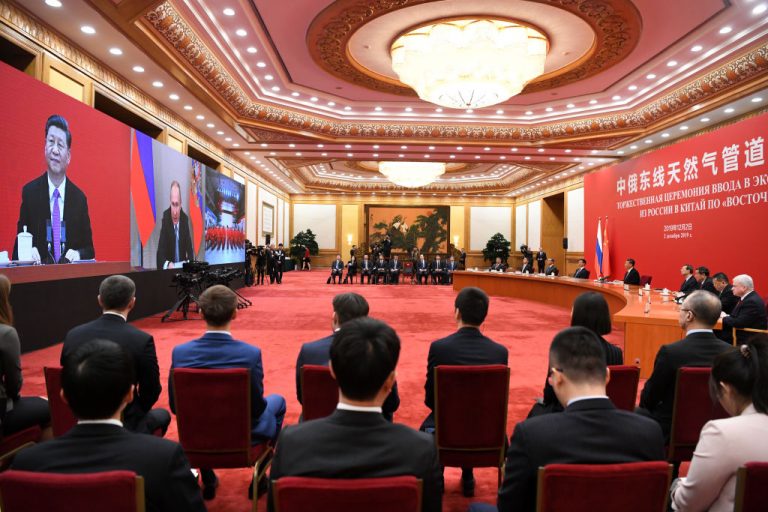 Chinese President Xi Jinping speaks with Russian President Vladimir Putin via a video link, from the Great Hall of the People on December 2, 2019 in Beijing, China.