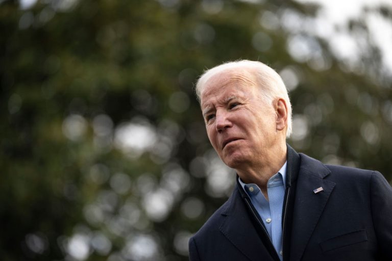 Joe Biden speaks to reporters as he walks to Marine One on the South Lawn of the White House December 15, 2021 in Washington, DC.