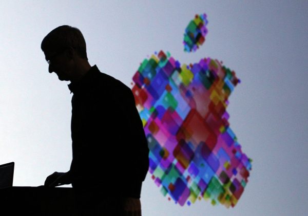 Apple CEO Tim Cook delivers the keynote address at the Apple 2012 World Wide Developers Conference (WWDC) at Moscone West on June 11, 2012, in San Francisco, California. Apple CEO Tim Cook brokered and signed an agreement worth more than $275 billion with Chinese officials, promising that Apple would do its part to develop China's economy and technological prowess through investments, business deals, and worker training.
