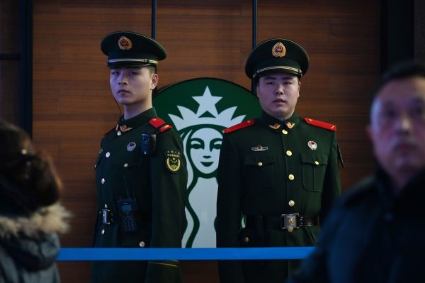 chinese-police-starbucks-china_GettyImages-1092608578.jpg