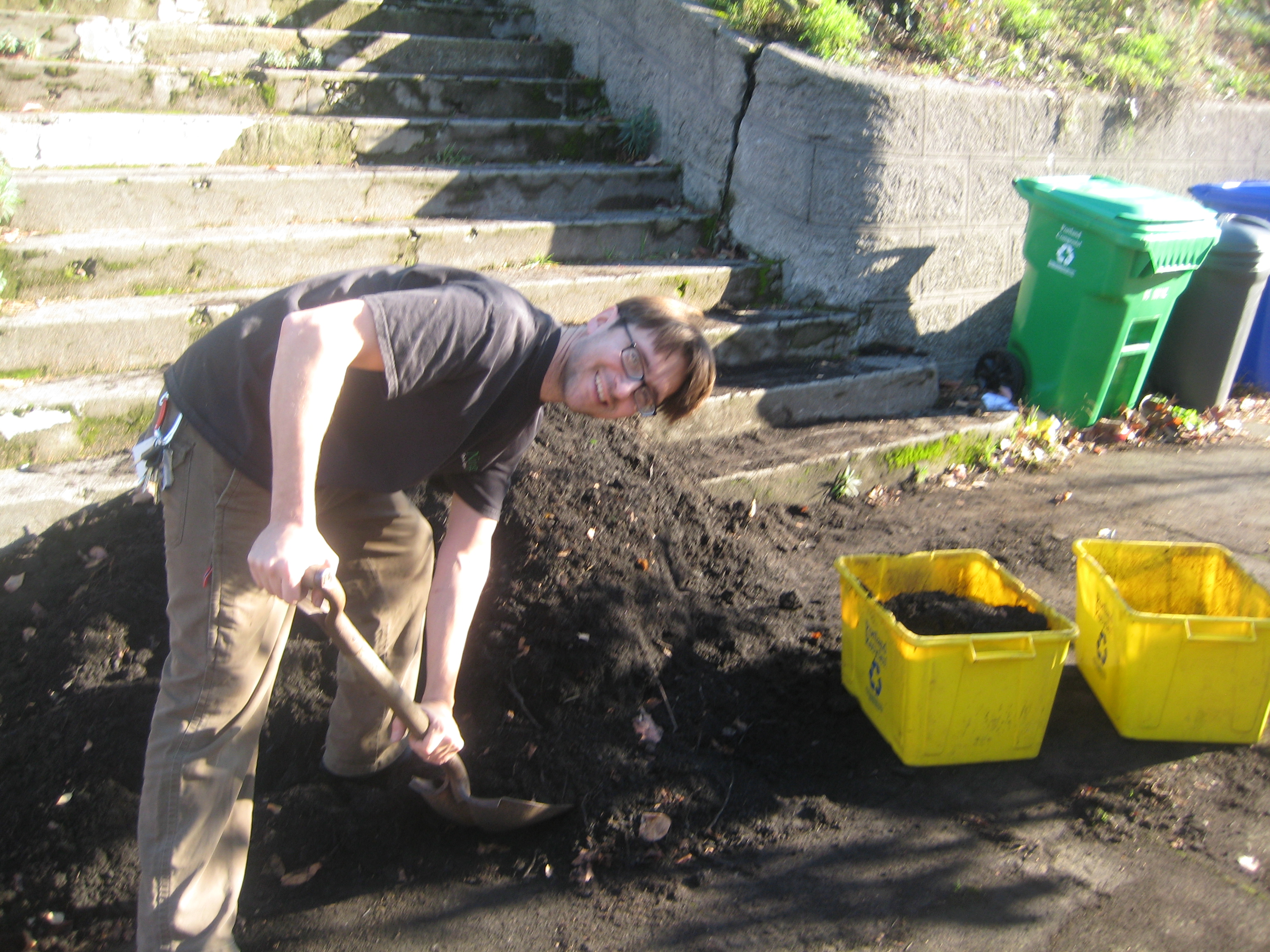 Man-shoveling-compost-Flickr