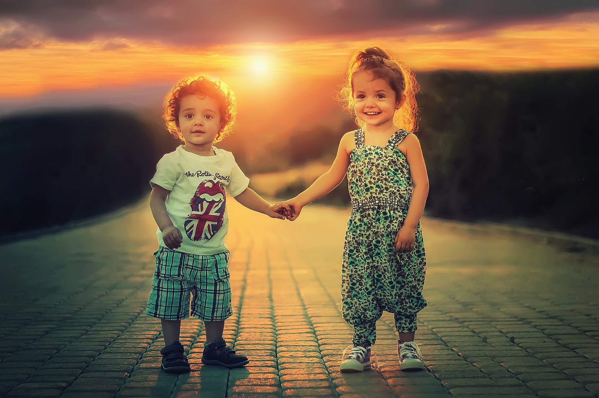 real children holding hands