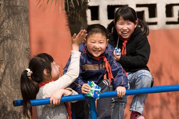 China-Encourages-3-Child-policy-Telling-Party-Comrades-to-Set-the-Example-three-children-kids-playground-Getty-Images-82067118