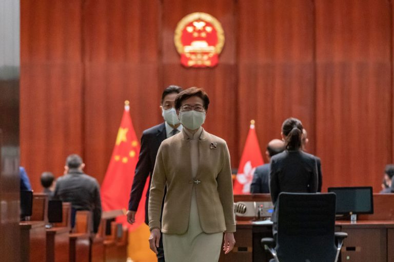 Hong Kong Chief Executive Carrie Lam leaves the Legislative Council main chamber after an oath-swearing ceremony on January 3, 2022 in Hong Kong, China.