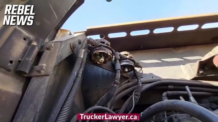 RCMP removed fuel filters and spray foamed fuel lines shut on three excavators stored on private land near the Coutts Alberta Montana Canada US border blockade