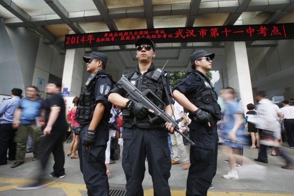 china-armed-police-guard-gaokao-examination-center-wuhan-2014_GettyImages-450209728