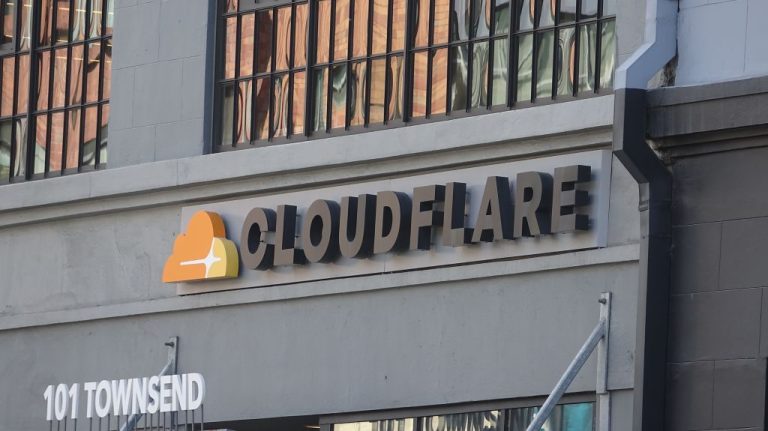 Close-up of logo on facade at headquarters of cyber security company Cloudflare in San Francisco, California, June 10, 2019. The firm said that a botnet composed of only 5,000 devices just set the DDOS attack record last week, which was mitigated by the company’s services. (Image: Smith Collection/Gado/Getty Images)