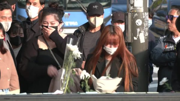 Mourners wept on Tuesday (November 1) as they laid tributes to those who lost their lives in the Halloween crush, which left more than 150 people dead in Seoul's Itaewon district, (Image: Reuters)