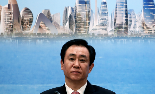 China Evergrande Group Chairman Hui Ka Yan attends a news conference on the property developer's annual results in Hong Kong, China March 28, 2017. (Image: Screenshot/REUTERS)