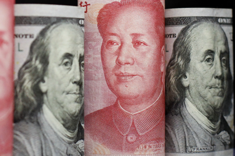 Banknotes of Chinese yuan and U.S. dollar are seen in this illustration picture taken September 29, 2022. (Image: Screenshot / REUTERS)