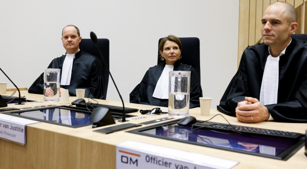 Public prosecutors Ward Ferdinandusse, Manon Ridderbeks, and Thijs Berger sit in the courtroom as the Dutch court announces its ruling in the MH17 trial of three Russians and a Ukrainian in the Schiphol Judicial Complex, Badhoevedorp, Netherlands, November 17, 2022.  (Image: Screenshot / REUTERS)