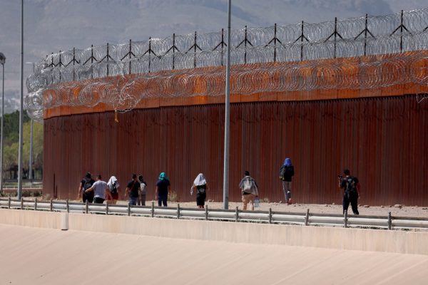 Southern Border migrant crisis invasion armored personnel carriers