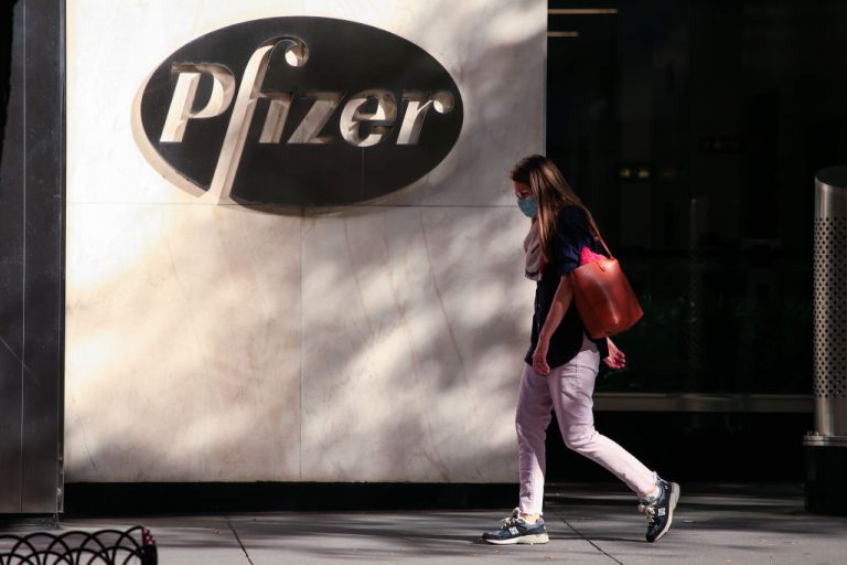 Pfizer was downgraded by UBS after Project Veritas caught a director on camera admitting the company conducted gain of function research to develop vaccines