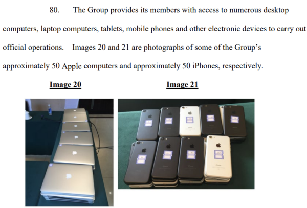 A photograph of 50 Apple computers and 50 iPhones with state classification stickers obtained by the FBI in its investigation against 34 members of the Chinese Communist Party’s Ministry of Public Security.