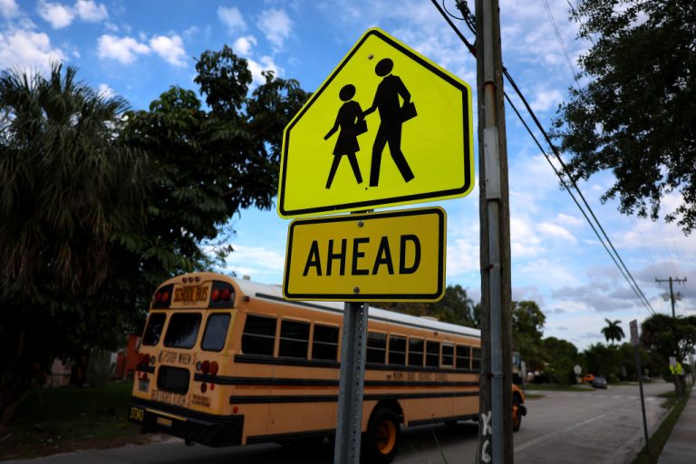 a-school-bus-in-front-of-an-elementary-school-on-april-19-2023-in-miami-florida-the-florida-board-of-education-approved-banning-discussion-in-the-classroom-of-sexual-orientation-and-gender-identity-for-all-grades-through-12-th-grade
