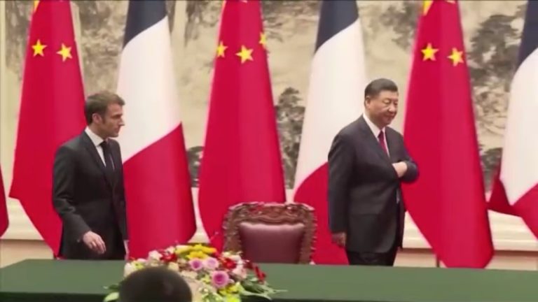 xi-flashing-leads-emmanuel-macron-at-the-first-day-of-his-state-visit-to-china