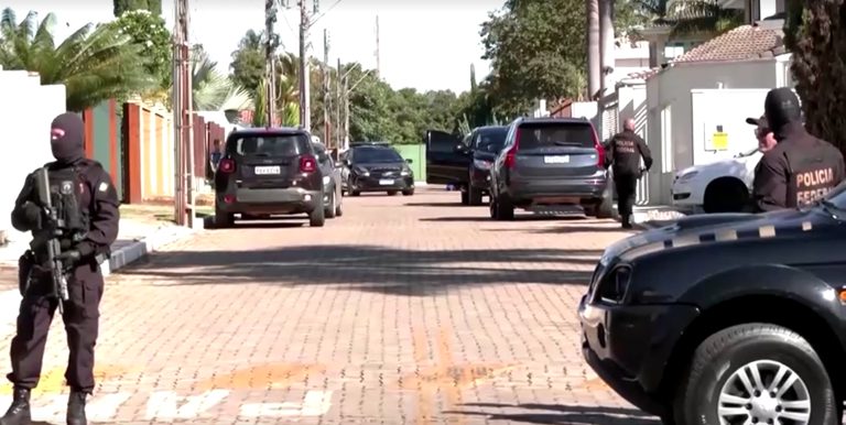 police-guards-posting-outside-former-brazilian-president-jair-bolsonaro-s-home-in-brasilia-brazil-during-a-raid-on-his-home-on-may-3