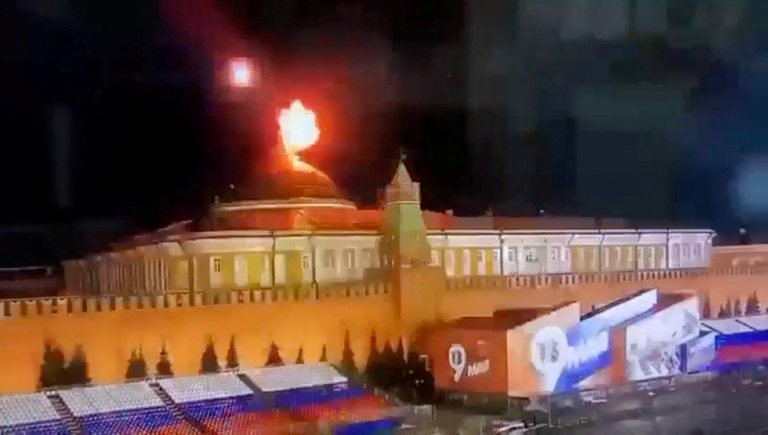 still-image-taken-from-video-shows-a-flying-object-exploding-in-an-intense-burst-of-light-near-the-dome-of-the-kremlin-senate-building-during-the-alleged-ukrainian-drone-attack-in-moscow