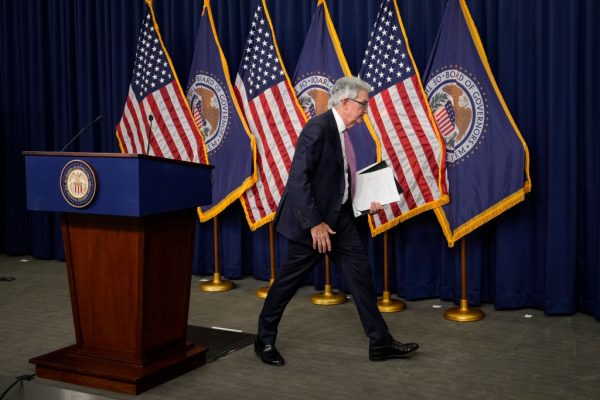 The Federal Reserve has paused interest rate hikes but will not be cutting for years to come, Powell says.
