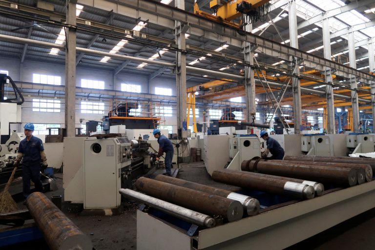 employees-work-on-the-production-line-at-jingjin-filter-press-factory-in-dezhou-shandong-province-global-production-lags-due-to-self-imposed-restrictions according-to-several-studies