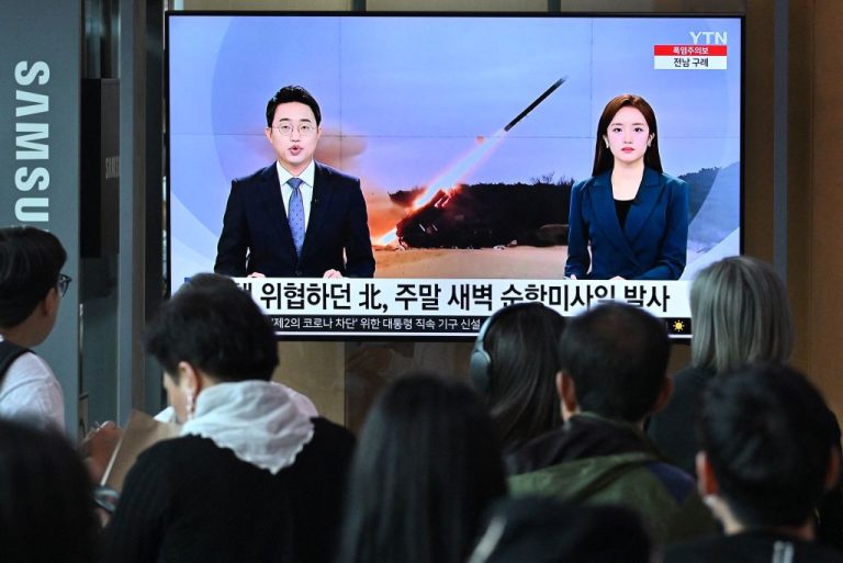 people-watch-a-television-screen-showing-a-news-broadcast-with-file-footage-of-a-north-korean-missile-test-at-a-railway-station-in-seoul-on-july-22-2023-north-korea-s-recent-military-activity-and-china-s-looming-invasion-of-taiwan-have-put-western-allies-japan-the-u-s-and-south-korea-on-high-alert