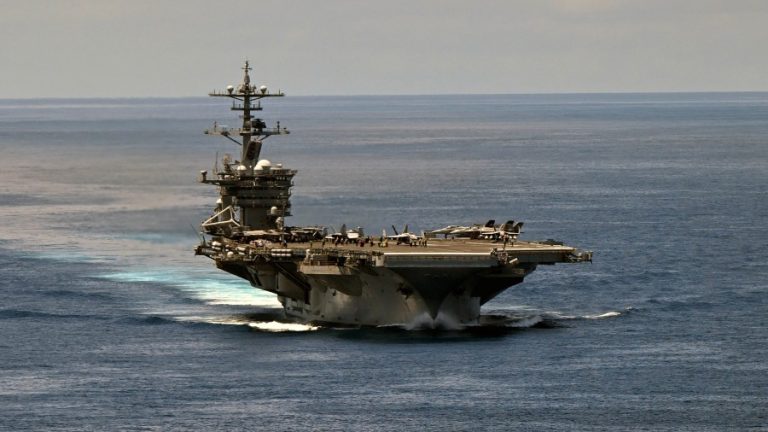 The U.S. Navy’s nuclear-powered aircraft carrier USS George Washington sails near the Pacific coast of Colombia on June 29, 2024. (Image: Joaquin Sarmiento/AFP via Getty Images)
